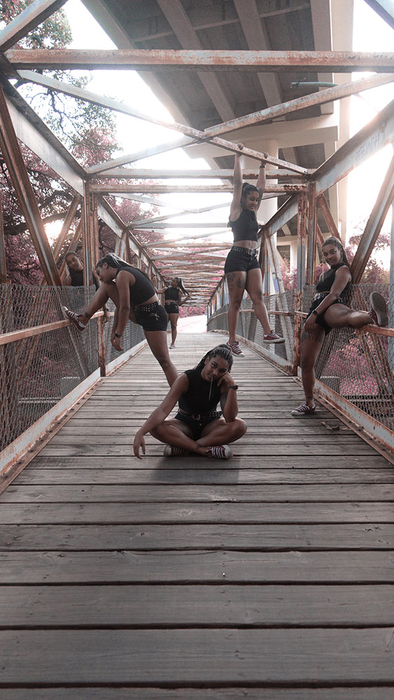 Meagan Bolds self-portrait of five of her on a bridge