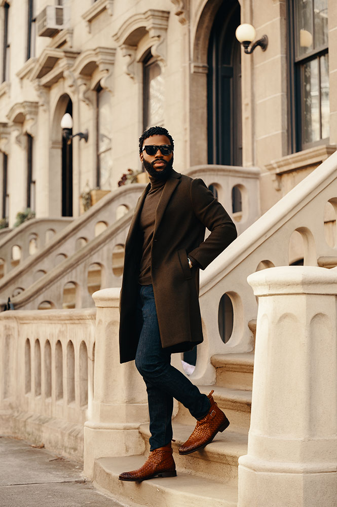 Aaron Pegg portrait of a man on the steps of a brownstone