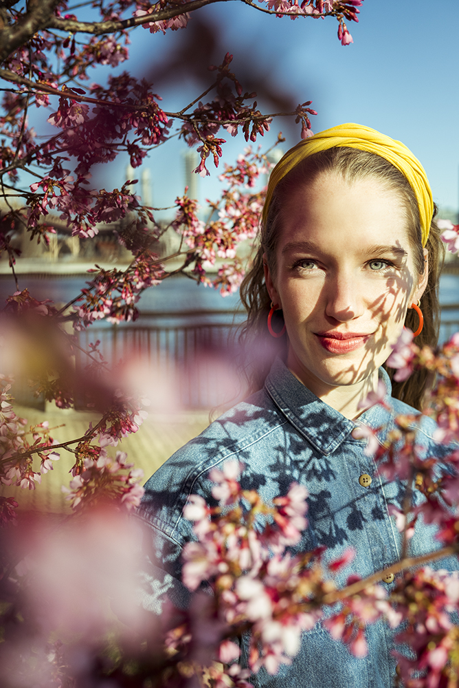 Gabriela Herman photo of a woman among cherry blossoms