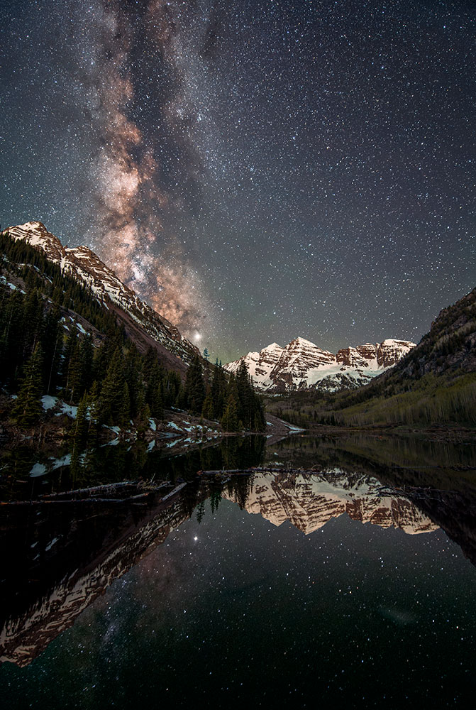 Dan Stein photo of the Milky Way in the sky over a lake and mountains