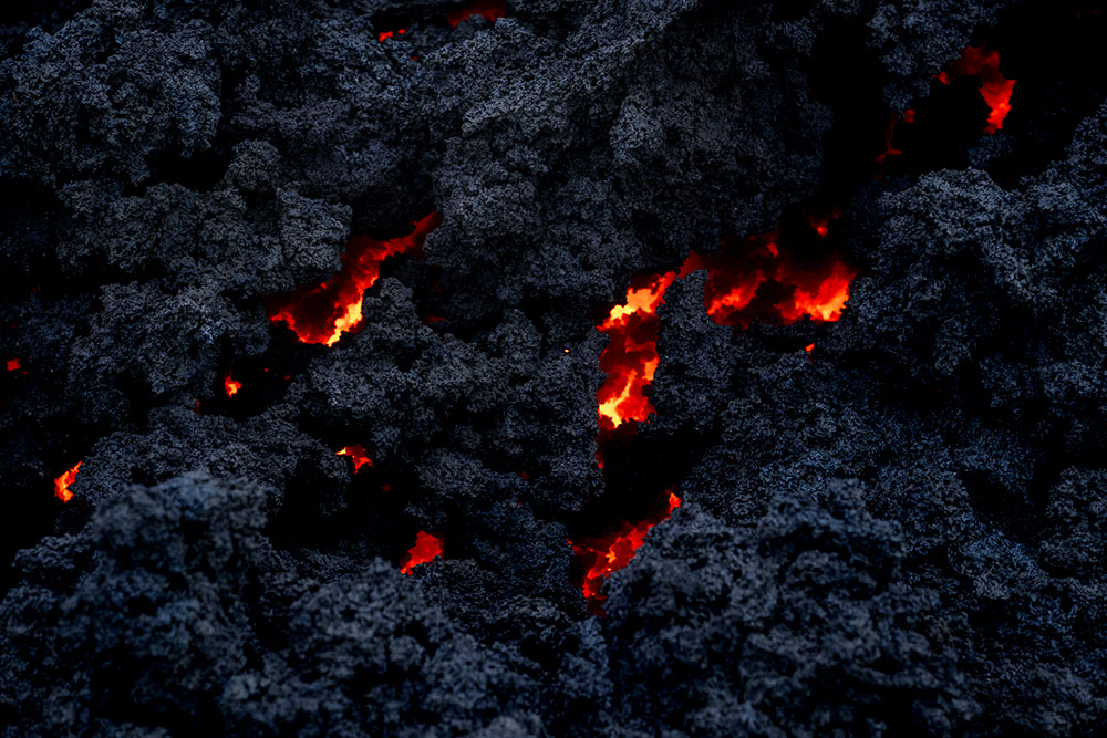 Fagradalsfjall volcano lava crusting over, photo by Mike Mezeul II