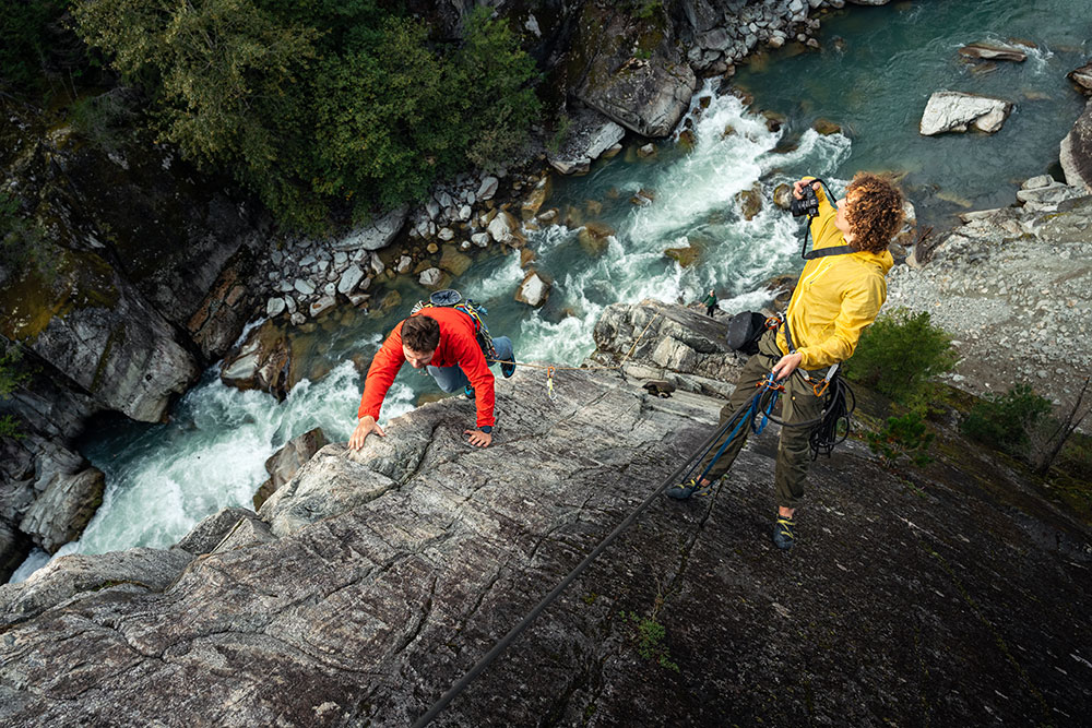 Ian Harland photo of him shooting a climber on the side of a mountain using the Z50II